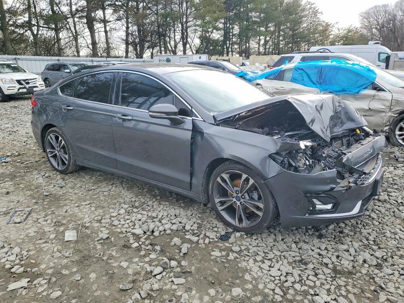 Photo 4 from auction – 2020 FORD FUSION TIT with VIN 3FA6P0D91LR151163