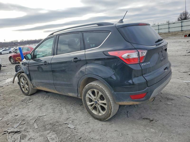 Photo 2 from auction – 2018 FORD ESCAPE SE with VIN 1FMCU9GD9JUB09769