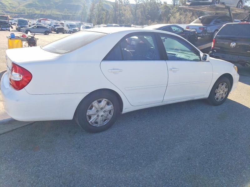 Photo 3 from auction – 2002 TOYOTA CAMRY LE with VIN JTDBE32K320114071