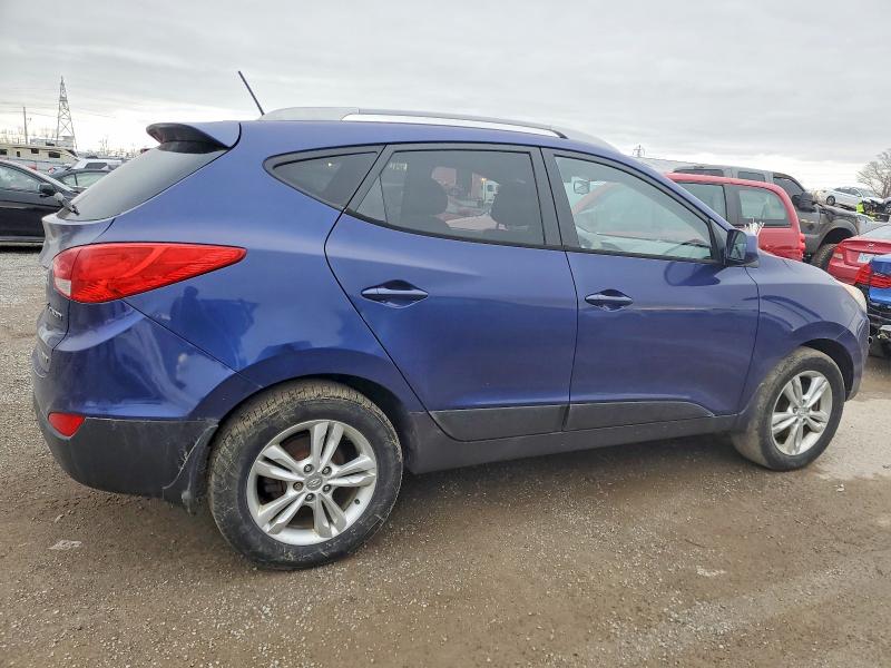 Photo 3 from auction – 2011 HYUNDAI TUCSON GLS with VIN KM8JUCAC4BU274179