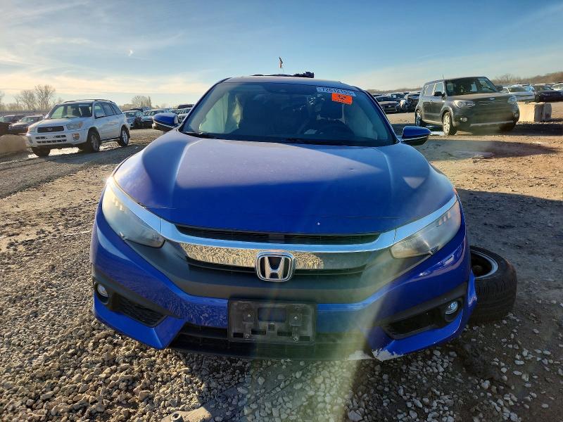 Photo 5 from auction – 2016 HONDA CIVIC with VIN 19XFC1F95GE005595