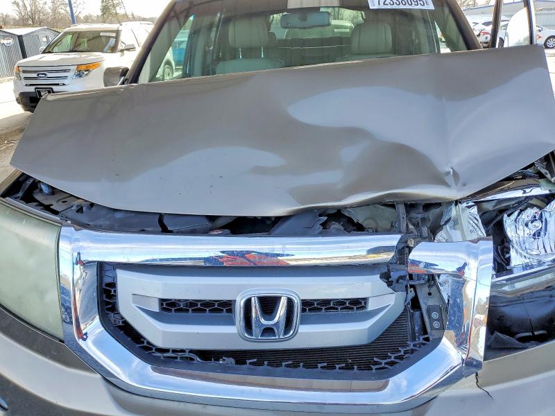 Photo 11 from auction – 2011 HONDA PILOT EXL with VIN 5FNYF3H62BB041584