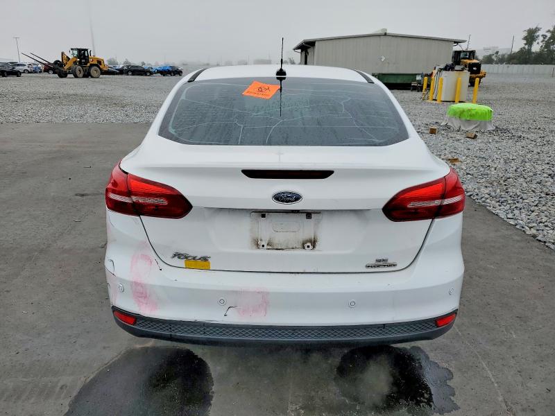 Photo 6 from auction – 2016 FORD FOCUS SE with VIN 1FADP3F25GL298759