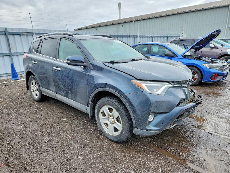 Photo 4 from auction – 2018 TOYOTA RAV4 LIMIT with VIN 2T3DFREV0JW821556