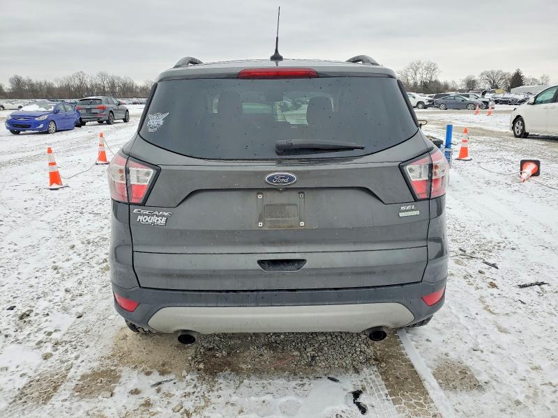 Photo 6 from auction – 2018 FORD ESCAPE with VIN 1FMCU0HD8JUC79339
