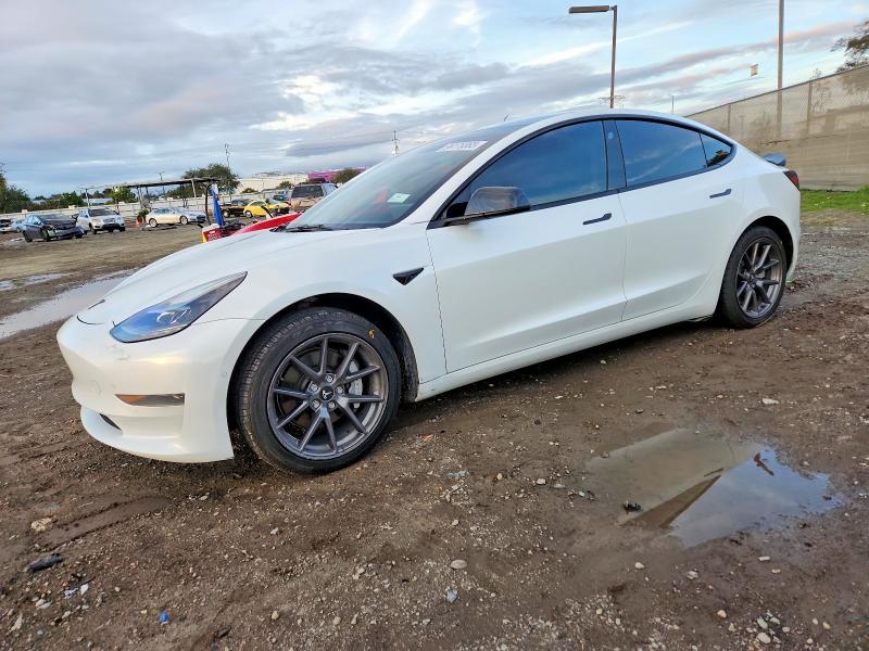 TESLA MODEL 3 2021 with VIN 5YJ3E1EA1MF100489 - Photo from auction