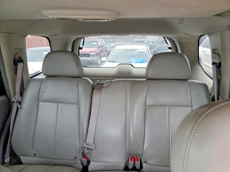 Photo 10 from auction – 2005 GMC ENVOY with VIN 1GKDS13S452103520