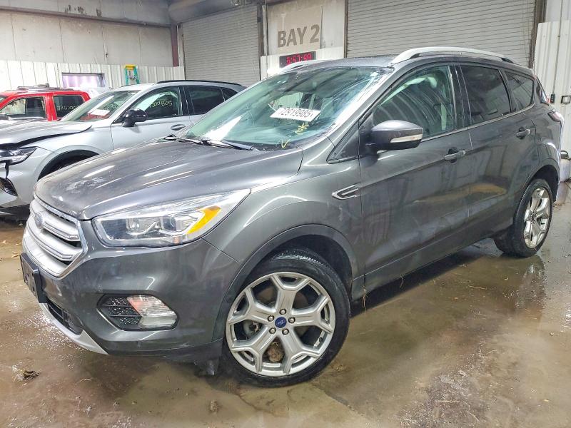FORD ESCAPE 2018 with VIN 1FMCU9J98JUC55813 - Photo from auction