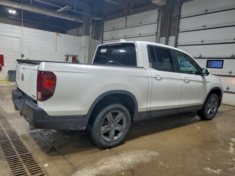 Photo 3 from auction – 2022 HONDA RIDGELINE with VIN 5FPYK3F55NB001596