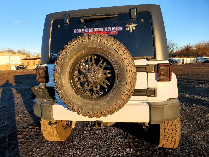 Photo 6 from auction – 2016 JEEP WRANGLER U with VIN 1C4BJWEGXGL231513