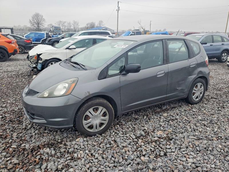 HONDA FIT 2011 with VIN JHMGE8G3XBS001273 - Photo from auction