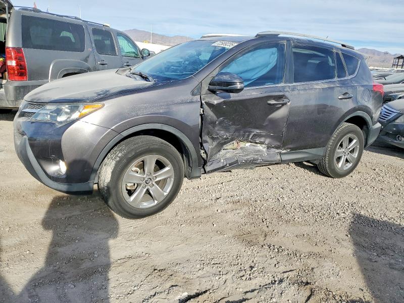 TOYOTA RAV4 XLE 2015 with VIN 2T3WFREV0FW209857 - Photo from auction