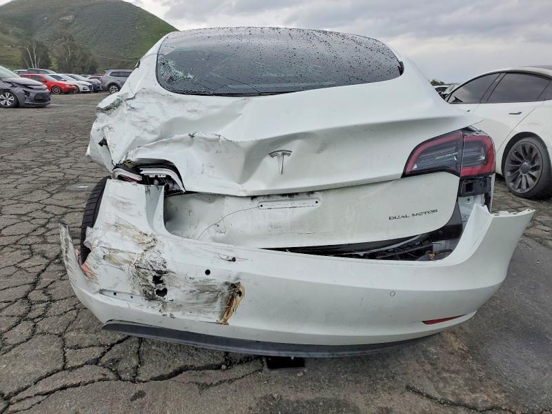Photo 6 from auction – 2022 TESLA MODEL 3 with VIN 5YJ3E1EB1NF334397