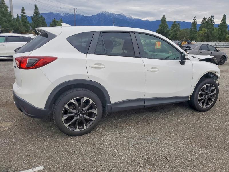 Photo 3 from auction – 2016 MAZDA CX-5 with VIN JM3KE2DY9G0807107