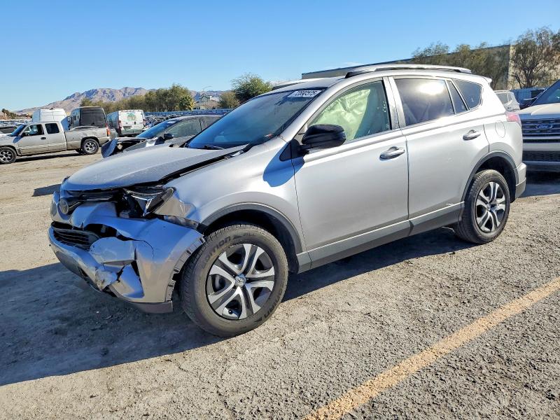 Photo 1 from auction – 2018 TOYOTA RAV4 LE with VIN JTMZFREV7JD131614