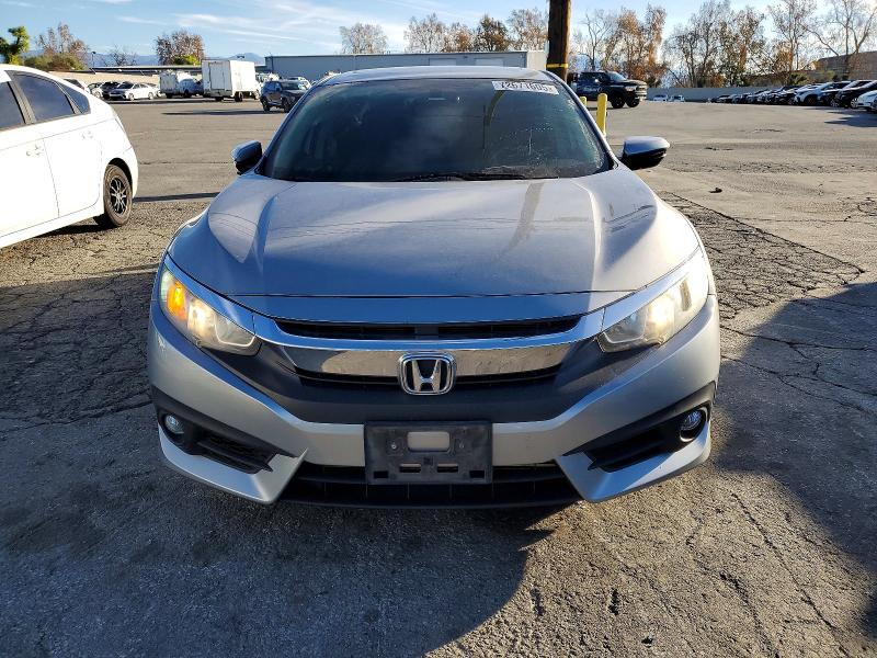 Photo 5 from auction – 2016 HONDA CIVIC with VIN 2HGFC1F39GH655256