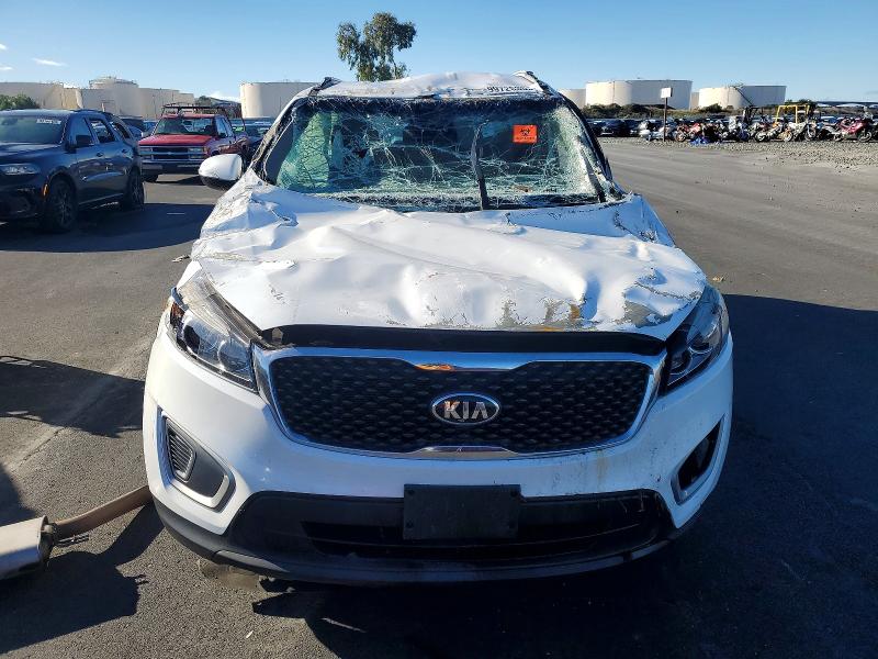 Photo 5 from auction – 2016 KIA SORENTO LX with VIN 5XYPG4A50GG051904