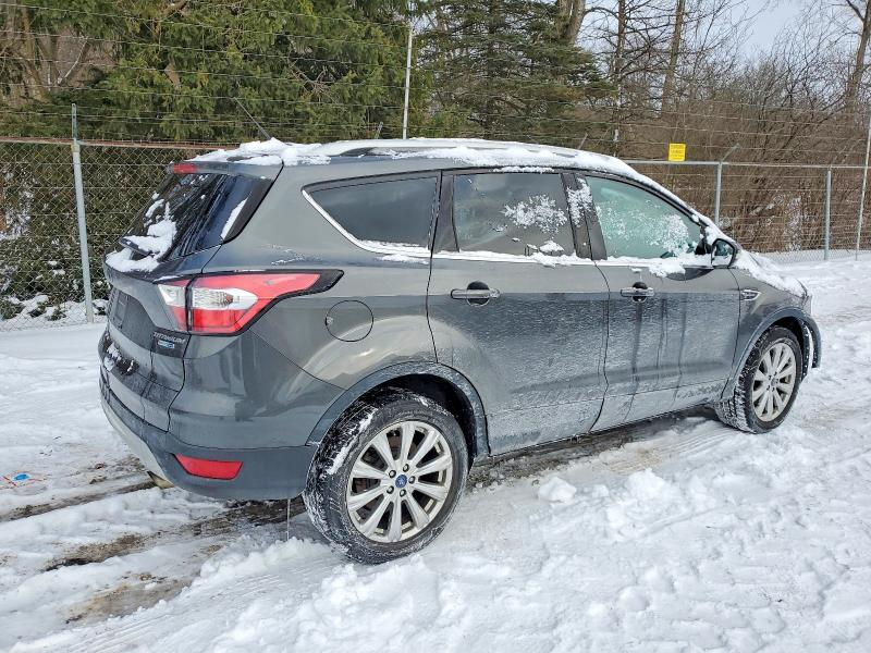 Photo 3 from auction – 2017 FORD ESCAPE TIT with VIN 1FMCU9JD7HUC08321