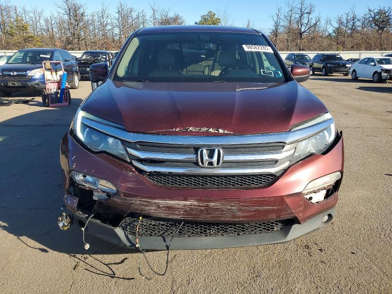 Photo 5 from auction – 2018 HONDA PILOT EXL with VIN 5FNYF6H50JB005075