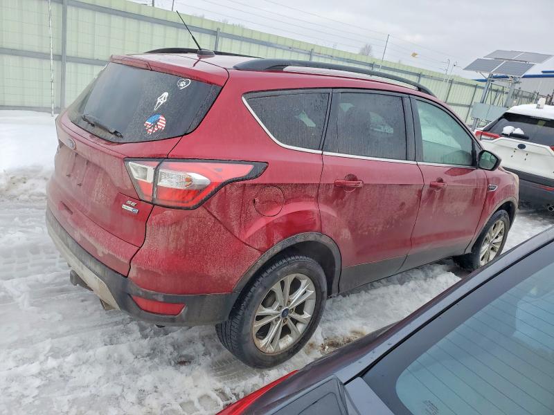 Photo 3 from auction – 2018 FORD ESCAPE SE with VIN 1FMCU9GD7JUB07356