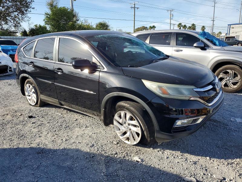 Photo 4 from auction – 2015 HONDA CR-V EX with VIN 2HKRM3H58FH530189