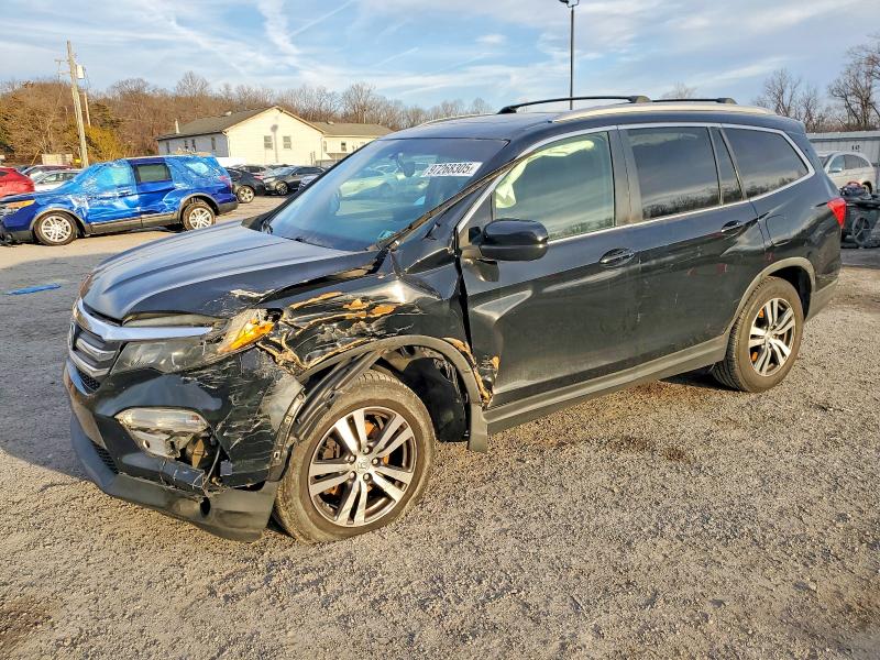 HONDA PILOT EXL 2016 with VIN 5FNYF6H53GB005709 - Photo from auction