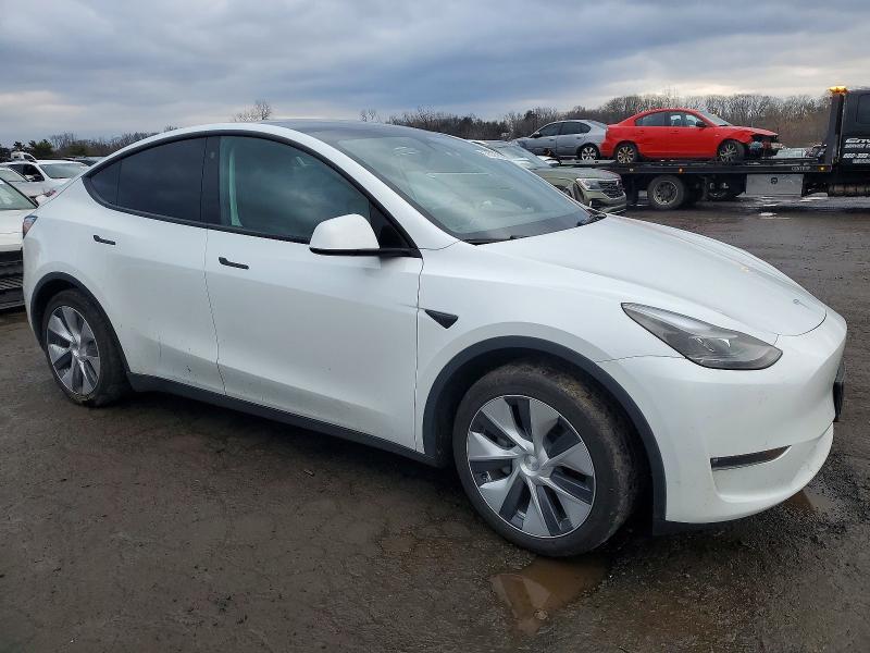 Photo 4 from auction – 2023 TESLA MODEL Y with VIN 7SAYGAEE1PF769274