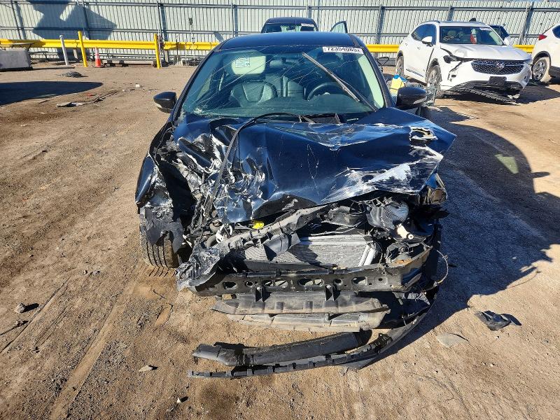 Photo 5 from auction – 2016 FORD FOCUS with VIN 1FADP3F24GL357090