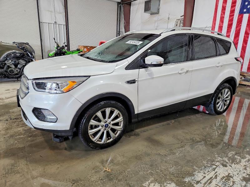 Photo 1 from auction – 2017 FORD ESCAPE TIT with VIN 1FMCU0J99HUA49034