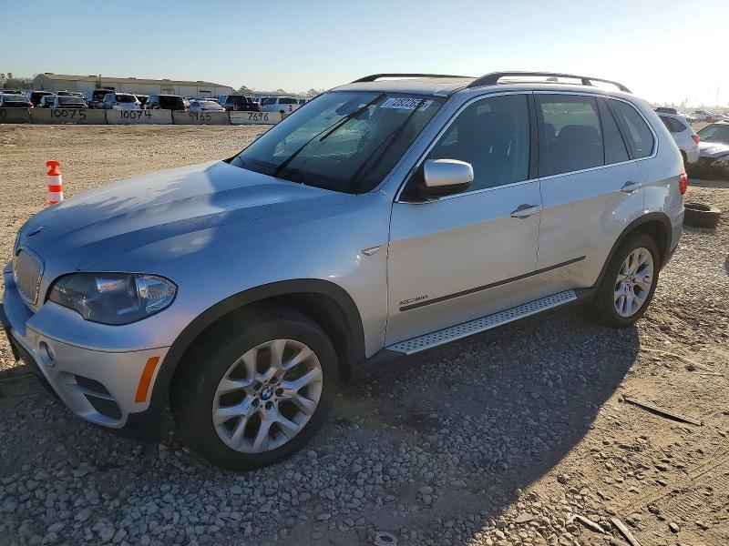 BMW X5 M 2013 with VIN 5UXZV4C5XD0E03045 - Photo from auction