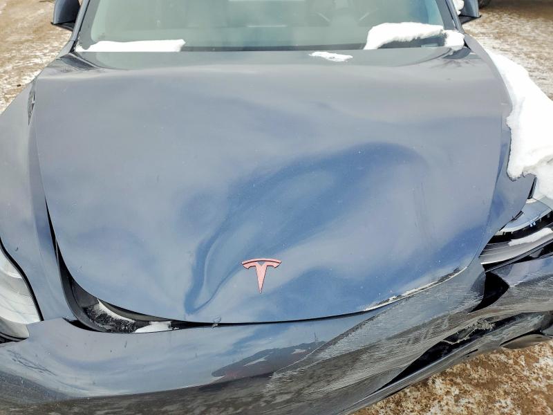 Photo 11 from auction – 2022 TESLA MODEL 3 with VIN 5YJ3E1EB8NF159503