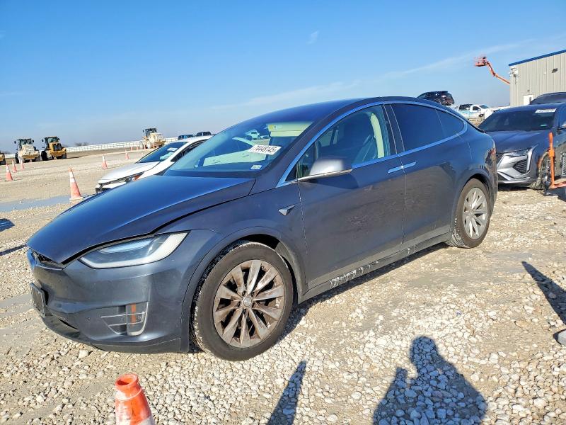 TESLA MODEL X 2017 with VIN 5YJXCBE29HF064028 - Photo from auction
