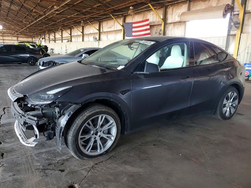 TESLA MODEL Y 2023 with VIN 7SAYGDEE8PF903649 - Photo from auction