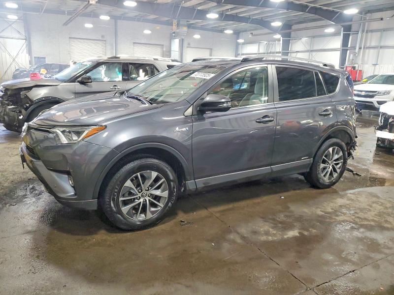 Photo 1 from auction – 2018 TOYOTA RAV4 HV LE with VIN JTMRJREV4JD227960