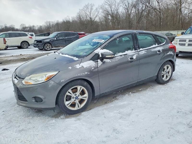 FORD FOCUS SE 2013 with VIN 1FADP3K21DL380490 - Photo from auction