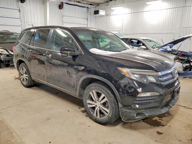 Photo 4 from auction – 2017 HONDA PILOT with VIN 5FNYF5H58HB042914