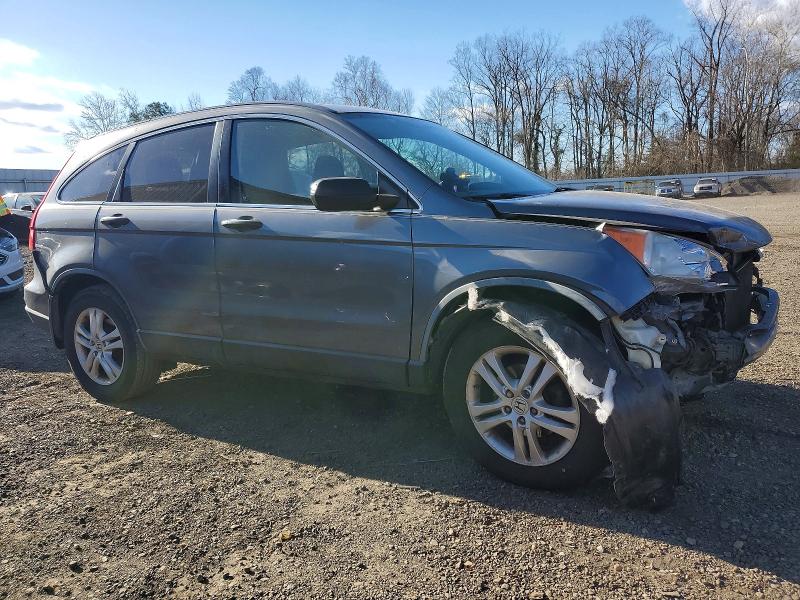 Photo 4 from auction – 2011 HONDA CR-V EX with VIN JHLRE4H51BC035103