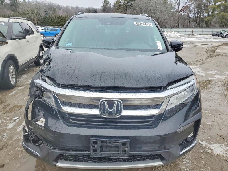 Photo 5 from auction – 2022 HONDA PILOT TOUR with VIN 5FNYF6H62NB062117