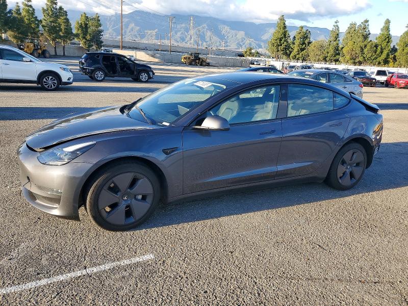 TESLA MODEL 3 2023 with VIN 5YJ3E1EA0PF617464 - Photo from auction