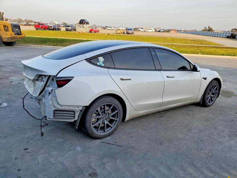 Photo 3 from auction – 2023 TESLA MODEL 3 with VIN 5YJ3E1EA4PF593394