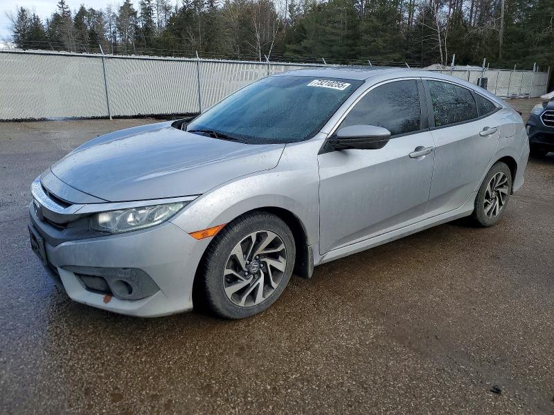 HONDA CIVIC 2018 with VIN 2HGFC2F84JH006618 - Photo from auction
