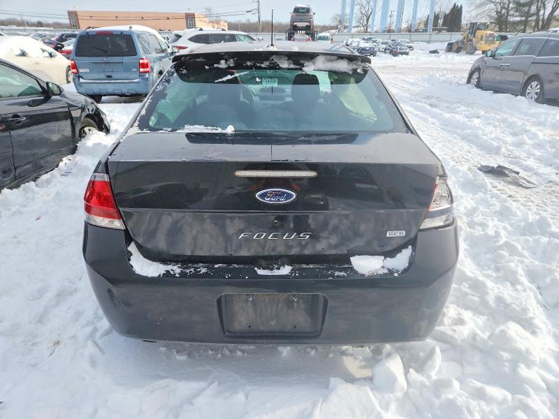 Photo 6 from auction – 2009 FORD FOCUS with VIN 1FAHP33N59W146997