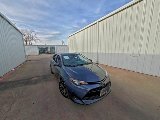 TOYOTA COROLLA L 2018 with VIN 5YFBURHE5JP784698 - Photo from auction