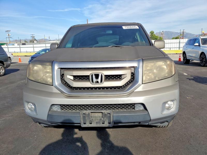Photo 5 from auction – 2011 HONDA PILOT TOUR with VIN 5FNYF4H90BB062644