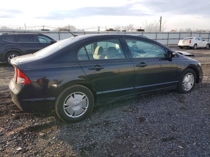 Photo 3 from auction – 2010 HONDA CIVIC HYBR with VIN JHMFA3F23AS006560