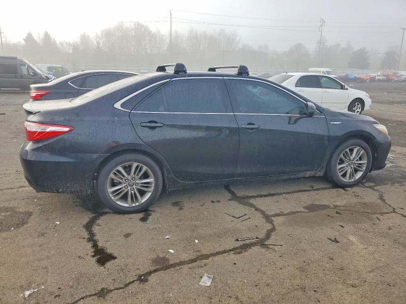 Photo 3 from auction – 2016 TOYOTA CAMRY HYBR with VIN 4T1BD1FK5GU191182