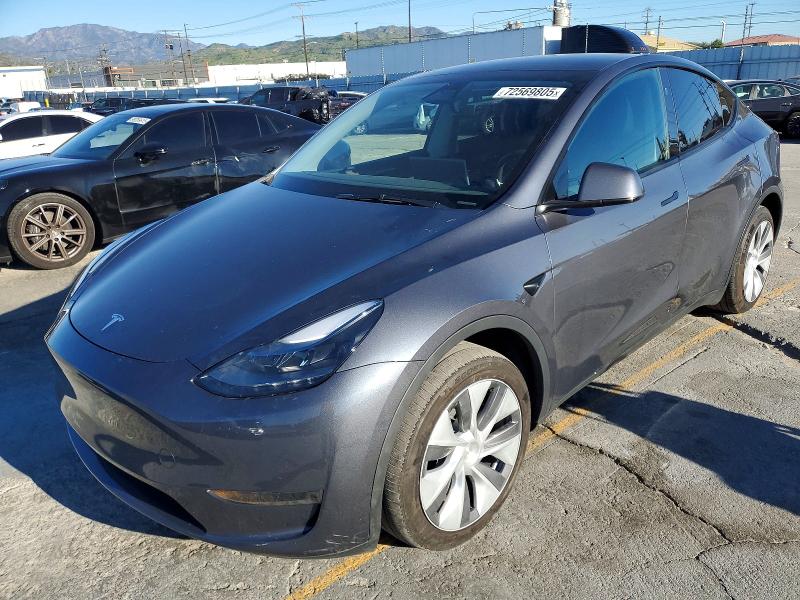 TESLA MODEL Y 2023 with VIN 7SAYGDEE5PA164527 - Photo from auction