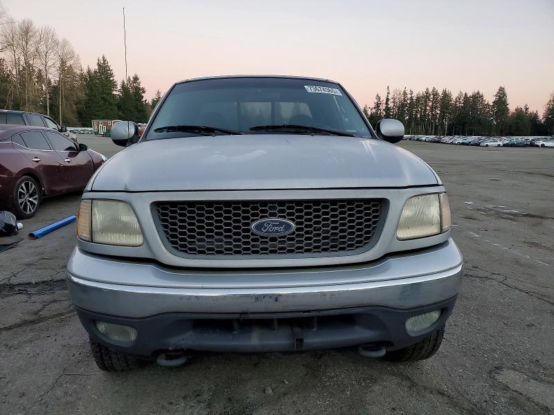 Photo 5 from auction – 2000 FORD F150 with VIN 1FTRX18L7YNA28321