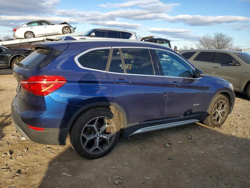 Photo 3 from auction – 2017 BMW X1 XDRIVE2 with VIN WBXHT3C36H5F76830