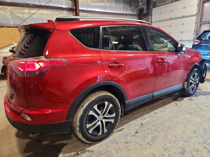 Photo 3 from auction – 2017 TOYOTA RAV4 LE with VIN JTMBFREVXHJ154530